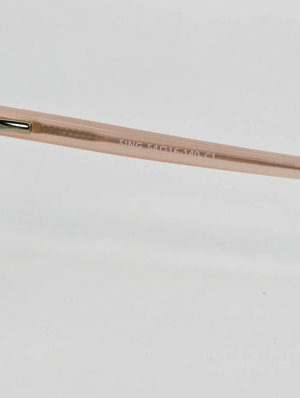 Sing. Subtle Pink Transparent Front Matte Temple Cat-Eye Frame.